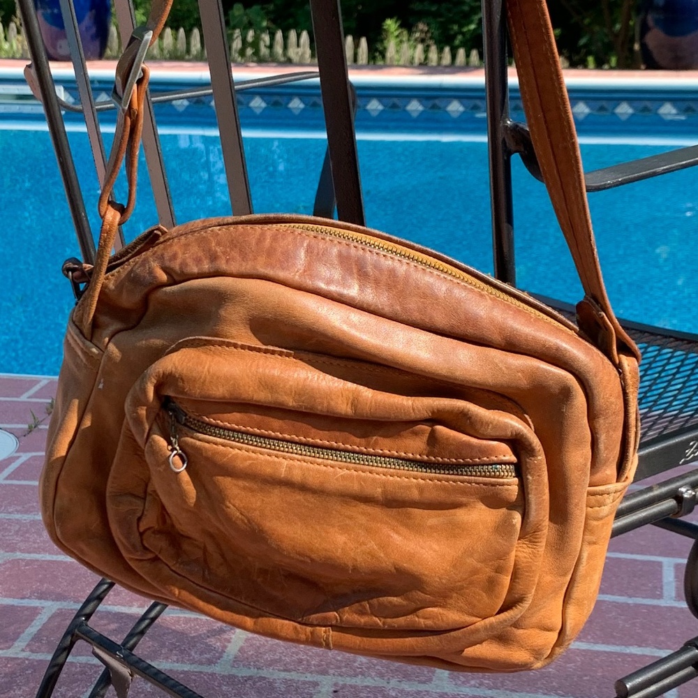 Vintage tan leather saddle bag